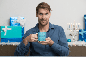 11-oz-coffee-mug-mockup-featuring-a-man-at-a-hanukkah-celebration-30645-1