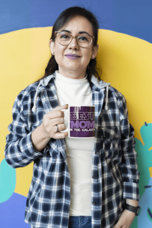 11-oz-coffee-mug-mockup-featuring-a-middle-aged-woman-posing-m24752-1
