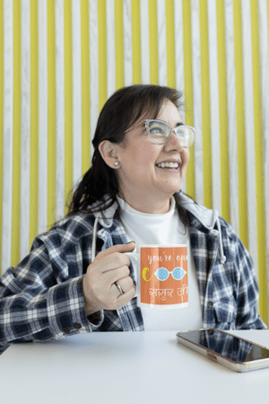 11-oz-coffee-mug-mockup-featuring-a-middle-aged-woman-with-glasses-m24751-3-1