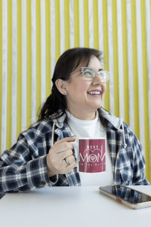 11-oz-coffee-mug-mockup-featuring-a-middle-aged-woman-with-glasses-m24751-4-1