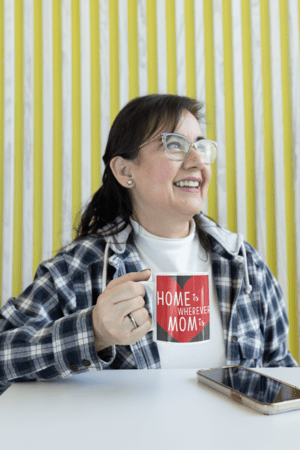 11-oz-coffee-mug-mockup-featuring-a-middle-aged-woman-with-glasses-m24751-5-1