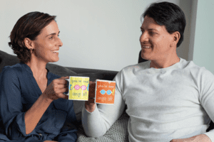 11-oz-coffee-mug-mockup-of-a-couple-drinking-coffee-and-talking-31696-2-1