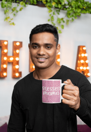 11-oz-coffee-mug-mockup-of-a-young-smiling-man-in-front-of-a-marquee-sign-28967-5-1