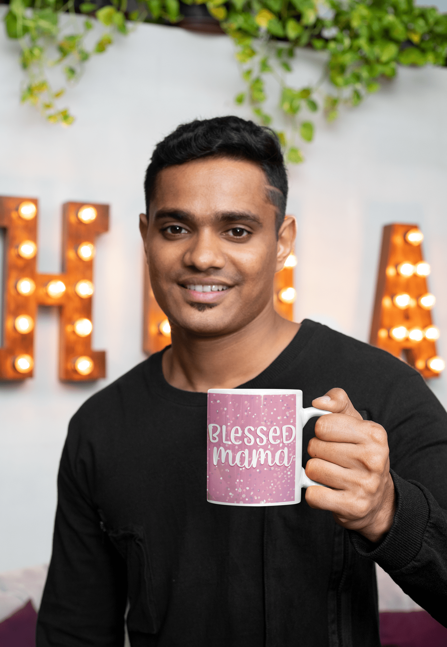 11-oz-coffee-mug-mockup-of-a-young-smiling-man-in-front-of-a-marquee-sign-28967-5