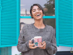 11-oz-colored-rim-mug-mockup-featuring-a-happy-woman-in-front-of-an-open-window-27842-1