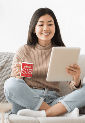 11-oz-mug-mockup-featuring-a-woman-with-a-tablet-on-a-couch-43498-r-el2-1