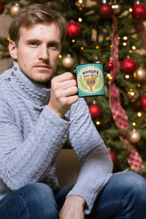 11-oz-mug-mockup-of-a-man-having-a-coffee-by-a-christmas-tree-30176-24-1