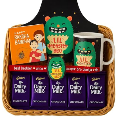 TheYayaCafe Lil Monster Kids Rakhi Gift Hamper with Apron, Mug, Rakhi and 5 Chocolates, Toddler and Kid from Sister