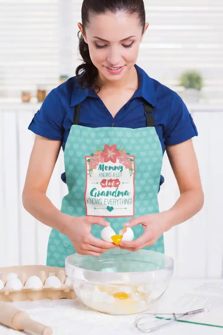 Mommy Knows a lot but grandma knows eveything apron