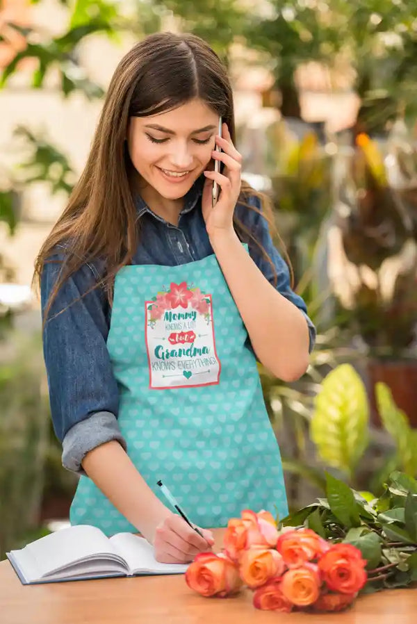 Mommy Knows a lot but grandma knows eveything apron