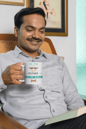 coffee-mug-mockup-featuring-a-man-reading-a-book-at-home-m29669-3-1