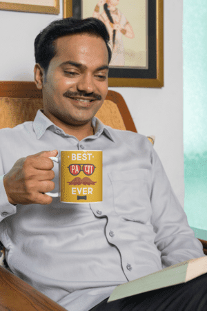coffee-mug-mockup-featuring-a-man-reading-a-book-at-home-m29669-4-1