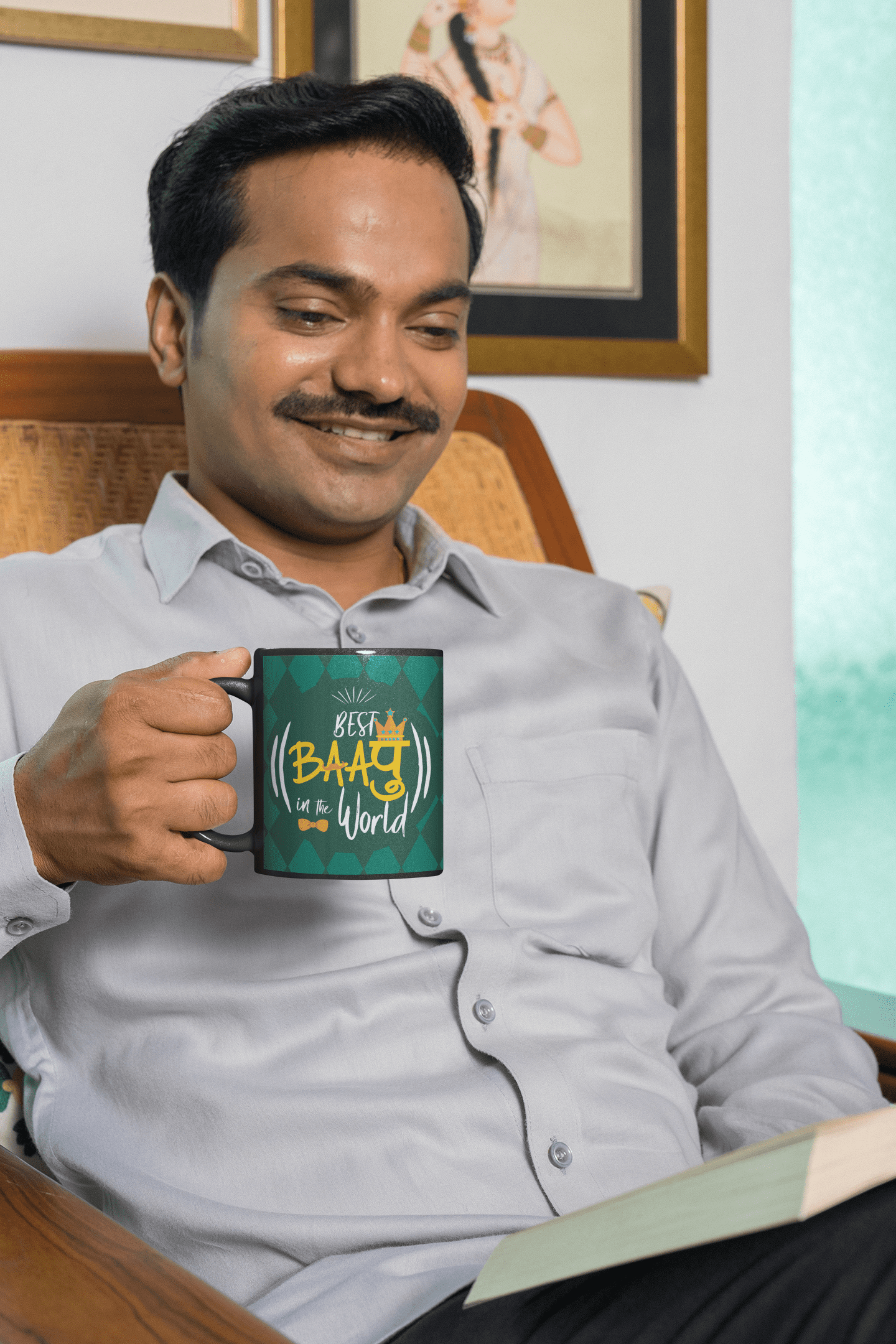 coffee-mug-mockup-featuring-a-man-reading-a-book-at-home-m29669