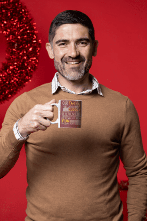 coffee-mug-mockup-featuring-a-middle-aged-man-in-a-christmas-setting-m18350-13-1
