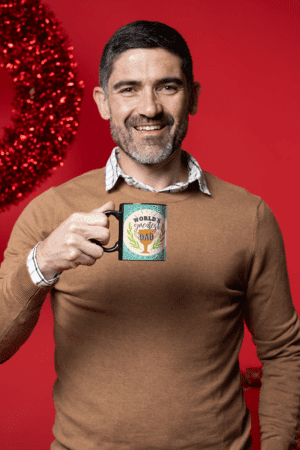 coffee-mug-mockup-featuring-a-middle-aged-man-in-a-christmas-setting-m18350-18-1