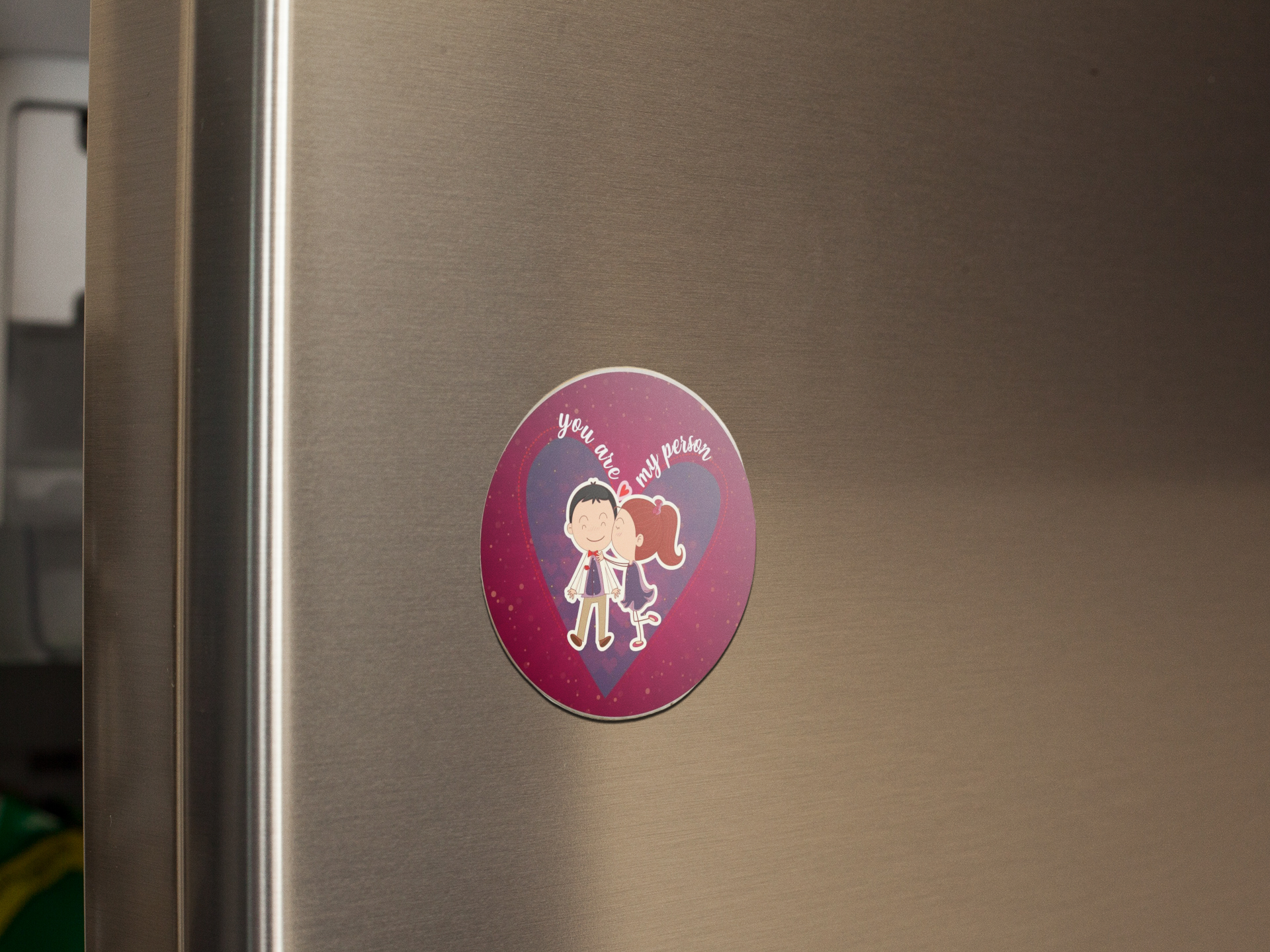 fridge-magnet-mockup-on-a-metallic-fridge-door-a14799