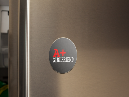 fridge-magnet-mockup-on-a-metallic-fridge-door-a14799