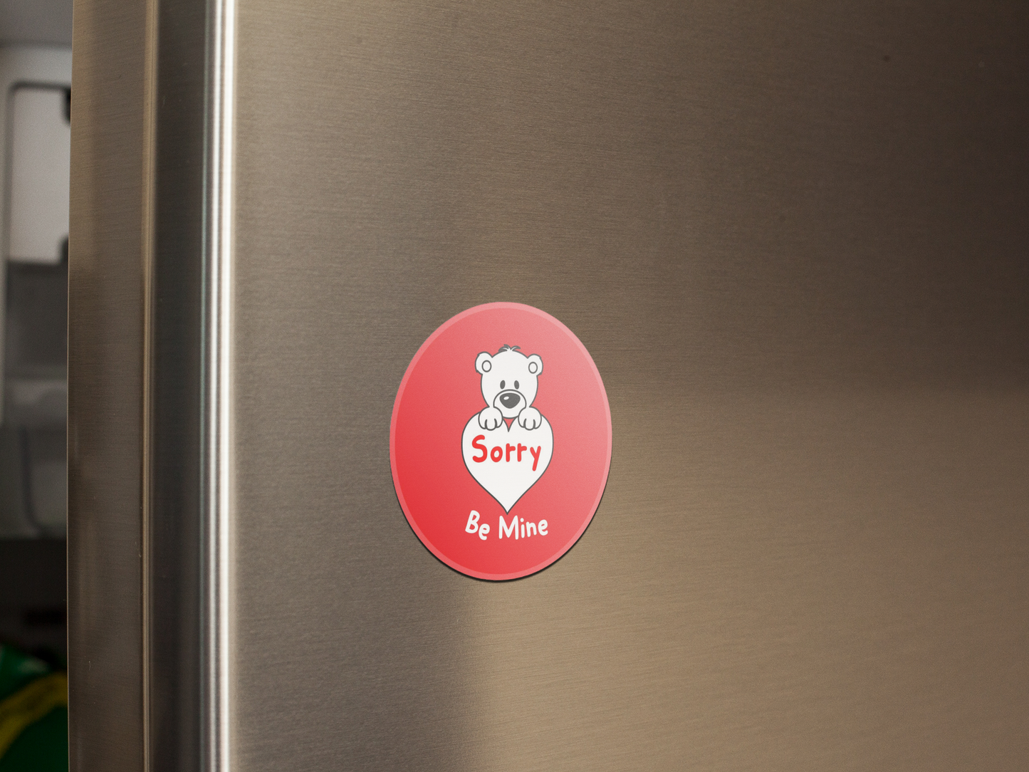 fridge-magnet-mockup-on-a-metallic-fridge-door-a14799