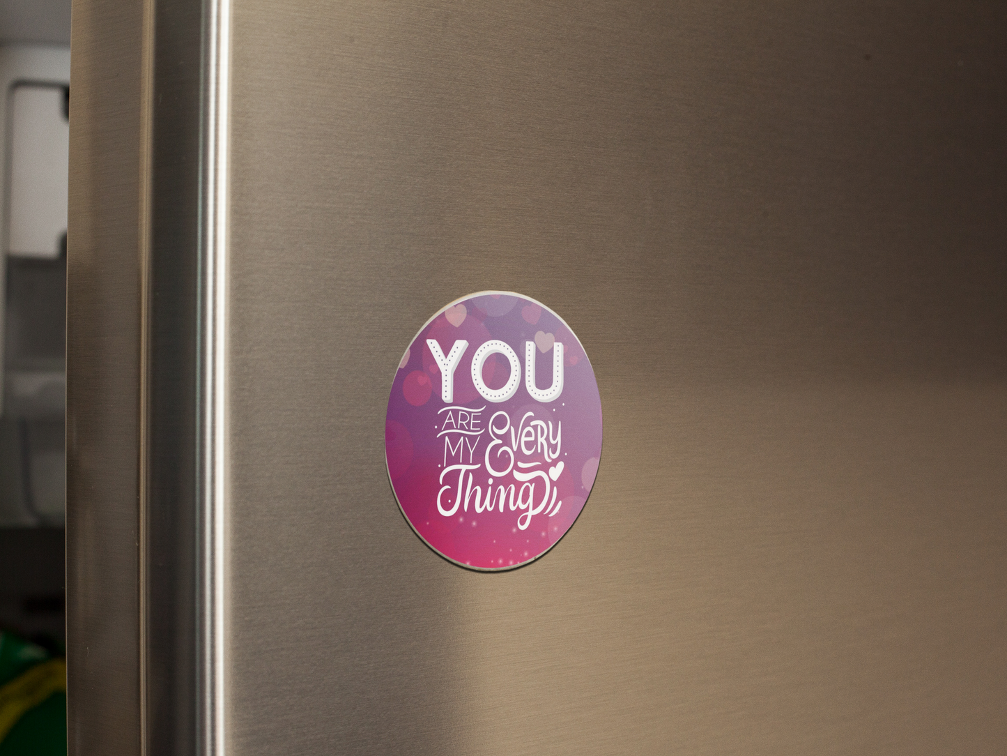 fridge-magnet-mockup-on-a-metallic-fridge-door-a14799