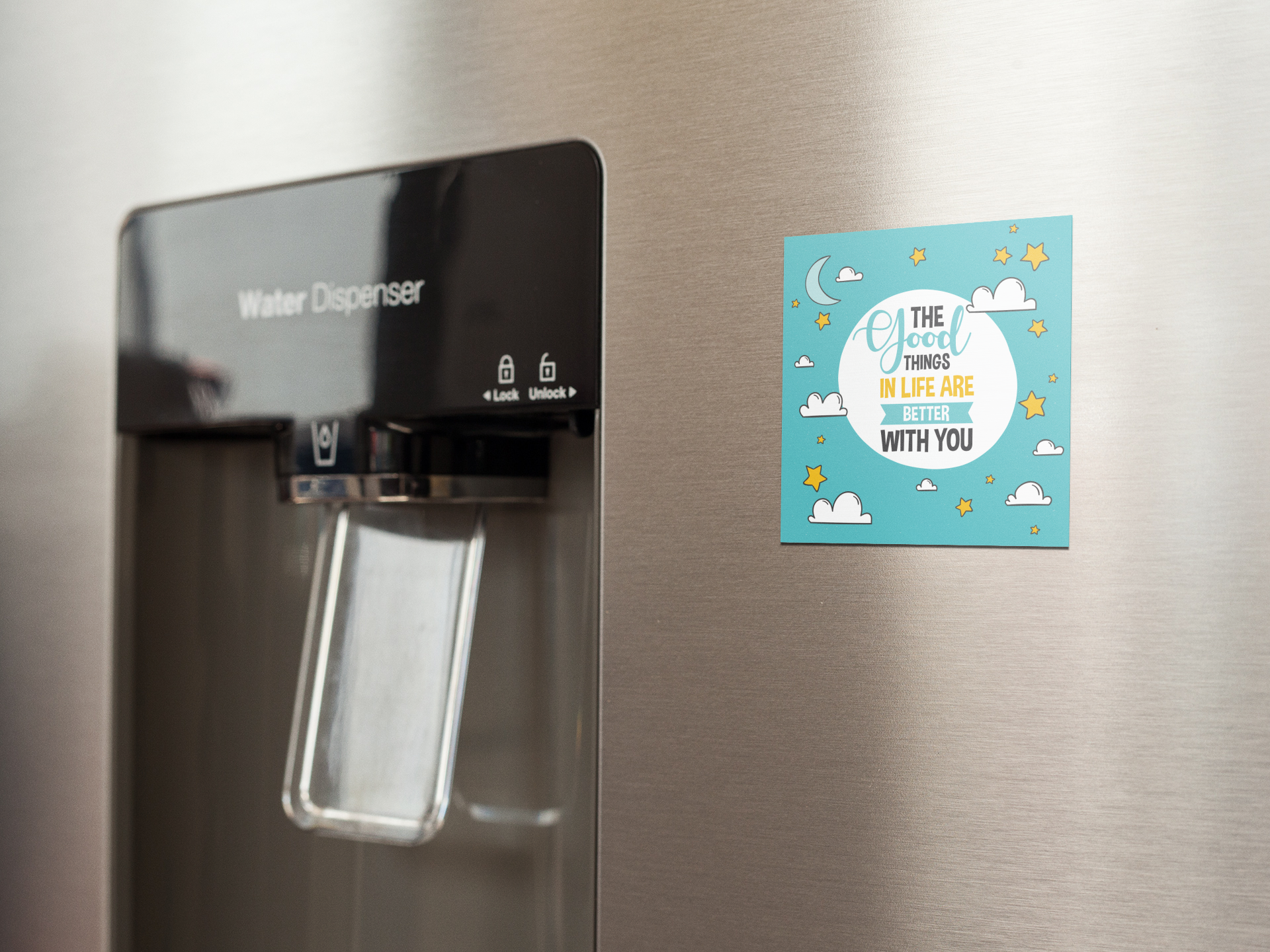 fridge-magnet-mockup-on-a-metallic-fridge-near-the-water-dispenser-a14790 (1)