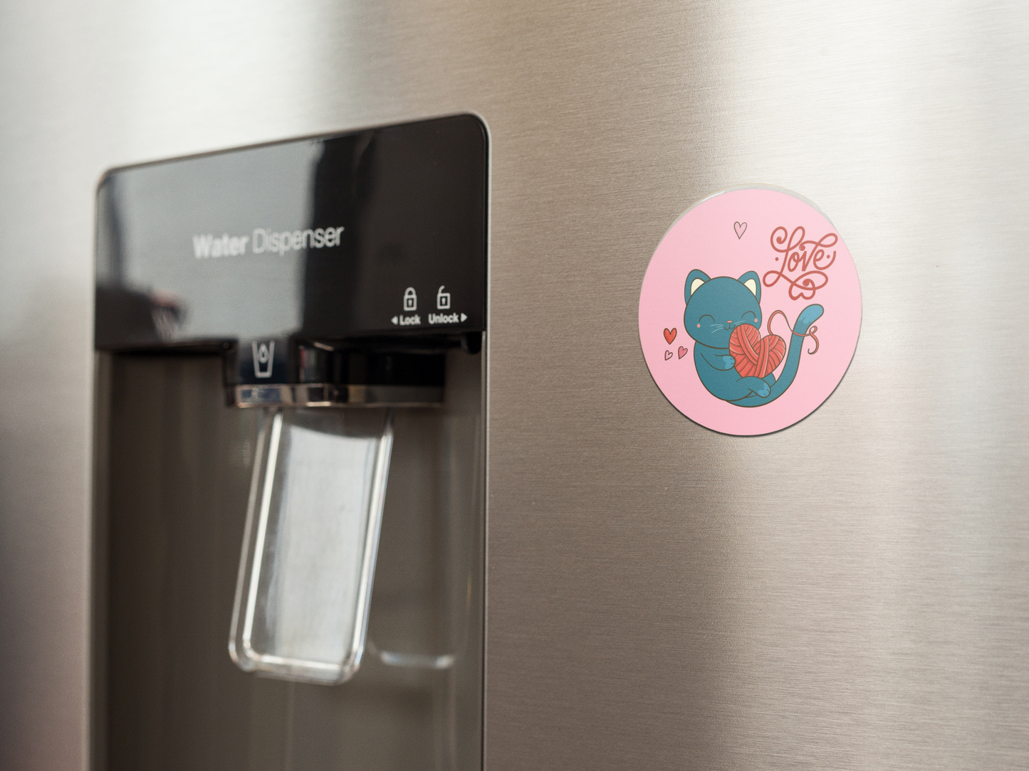 fridge-magnet-mockup-on-a-metallic-fridge-near-the-water-dispenser-a14790 (1)