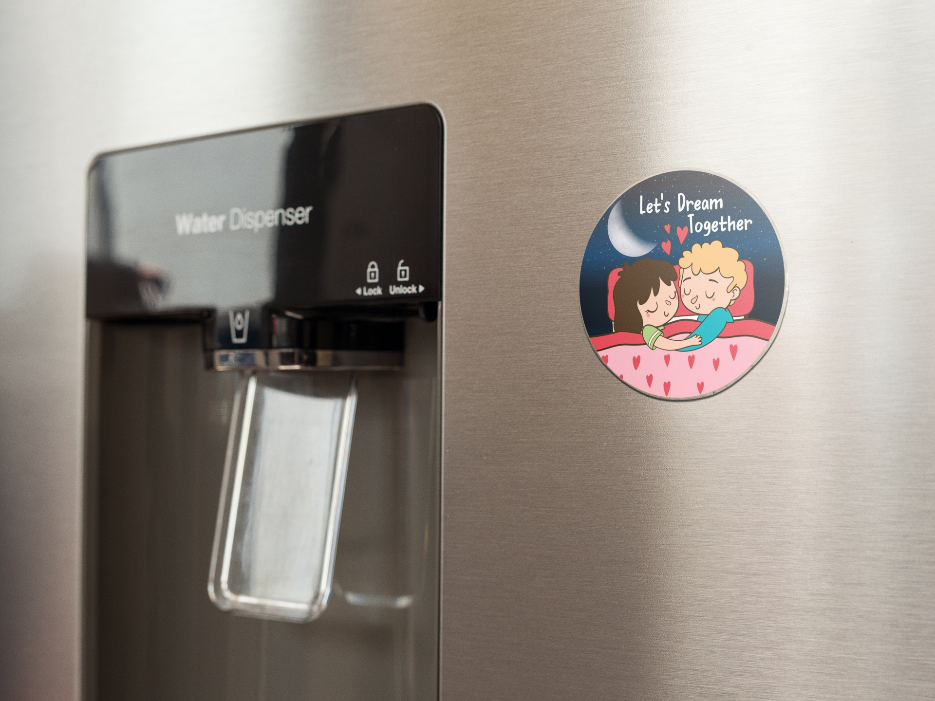 fridge-magnet-mockup-on-a-metallic-fridge-near-the-water-dispenser-a14790 (1)