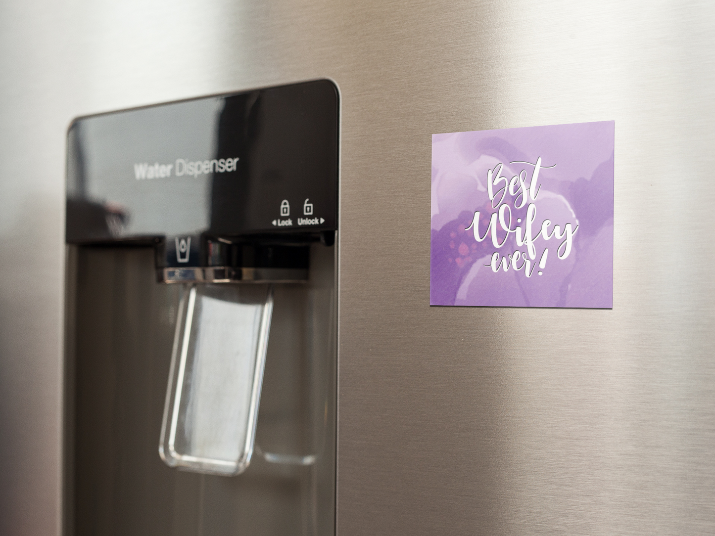 fridge-magnet-mockup-on-a-metallic-fridge-near-the-water-dispenser-a14790