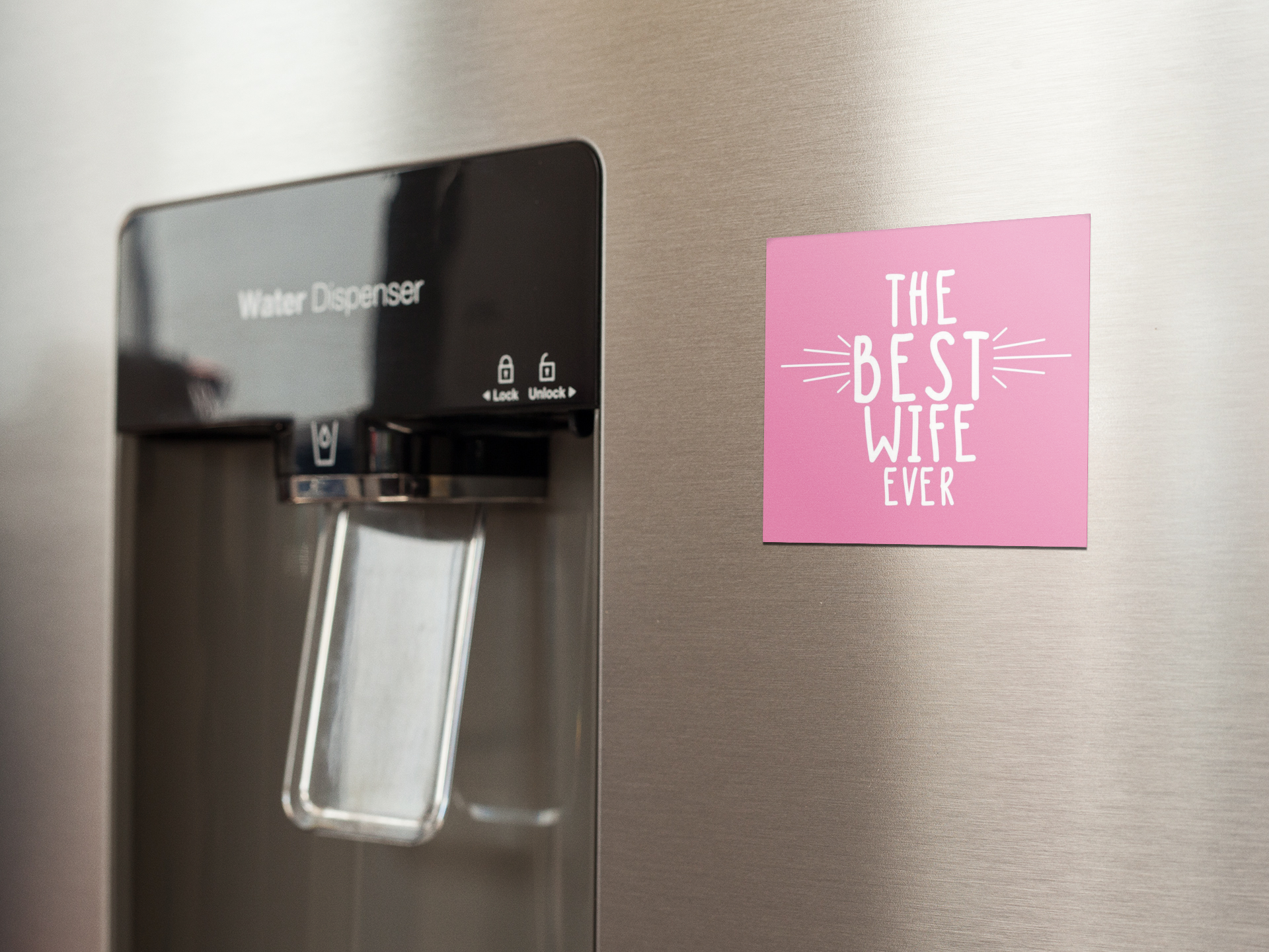 fridge-magnet-mockup-on-a-metallic-fridge-near-the-water-dispenser-a14790