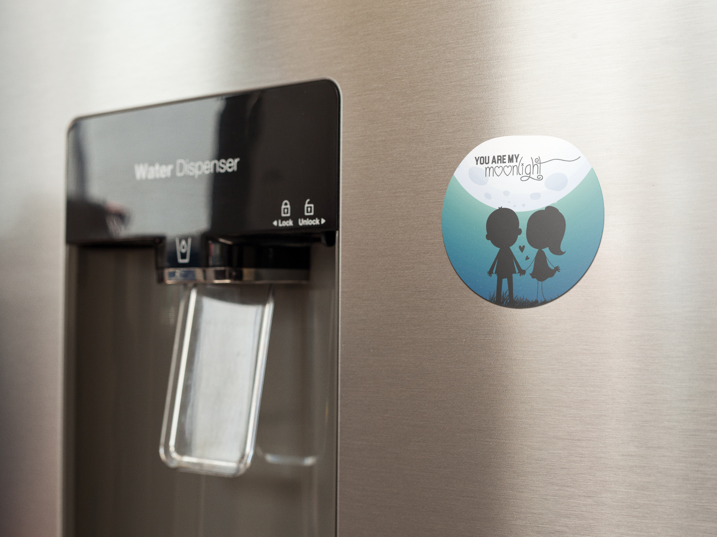 fridge-magnet-mockup-on-a-metallic-fridge-near-the-water-dispenser-a14790