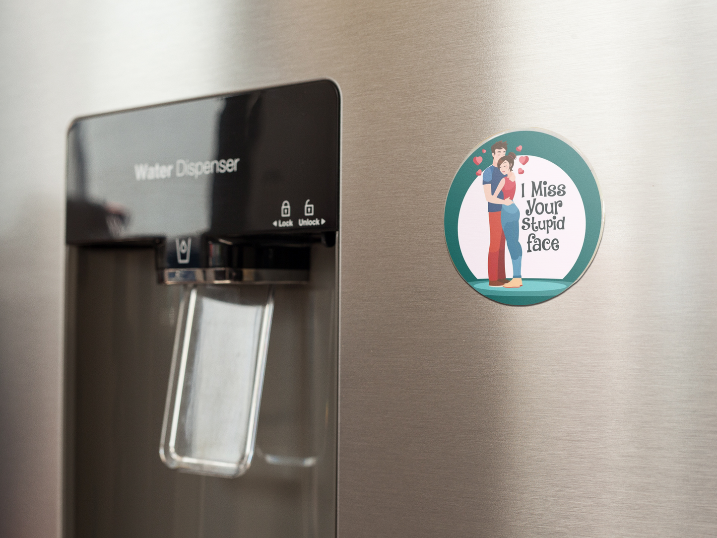fridge-magnet-mockup-on-a-metallic-fridge-near-the-water-dispenser-a14790