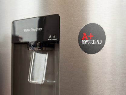 fridge-magnet-mockup-on-a-metallic-fridge-near-the-water-dispenser-a14790