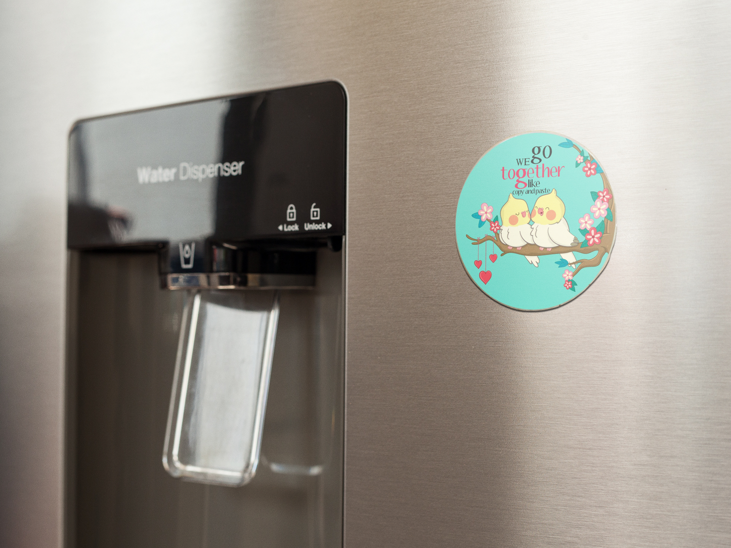 fridge-magnet-mockup-on-a-metallic-fridge-near-the-water-dispenser-a14790