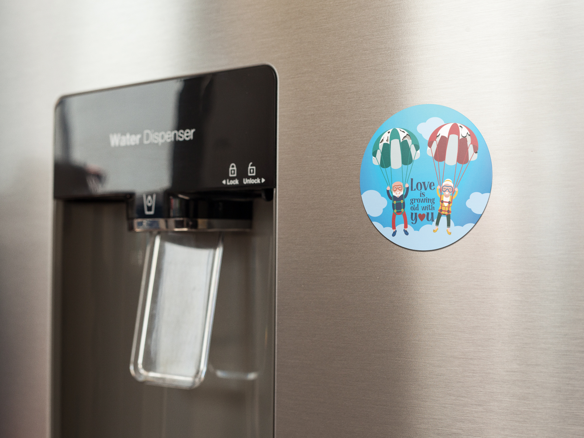 fridge-magnet-mockup-on-a-metallic-fridge-near-the-water-dispenser-a14790