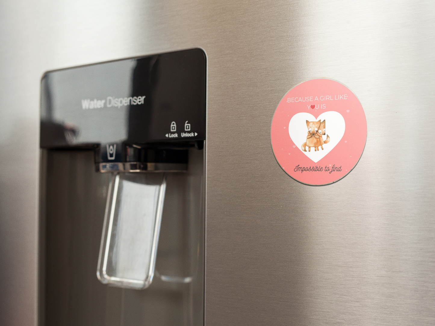 fridge-magnet-mockup-on-a-metallic-fridge-near-the-water-dispenser-a14790
