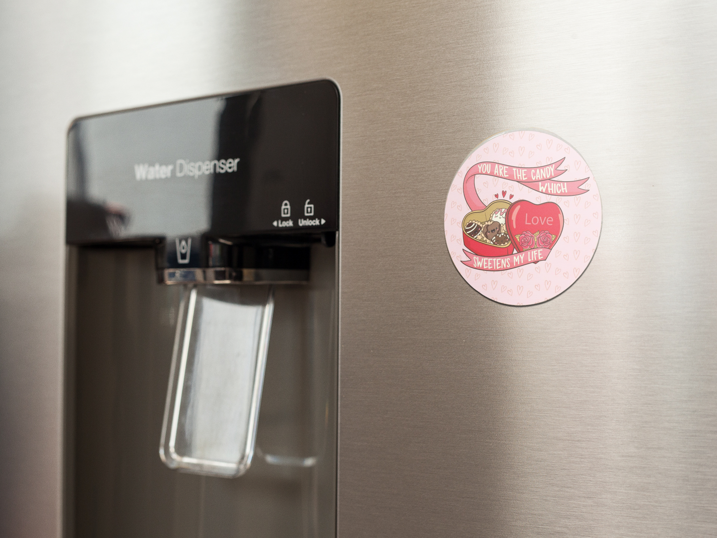 fridge-magnet-mockup-on-a-metallic-fridge-near-the-water-dispenser-a14790