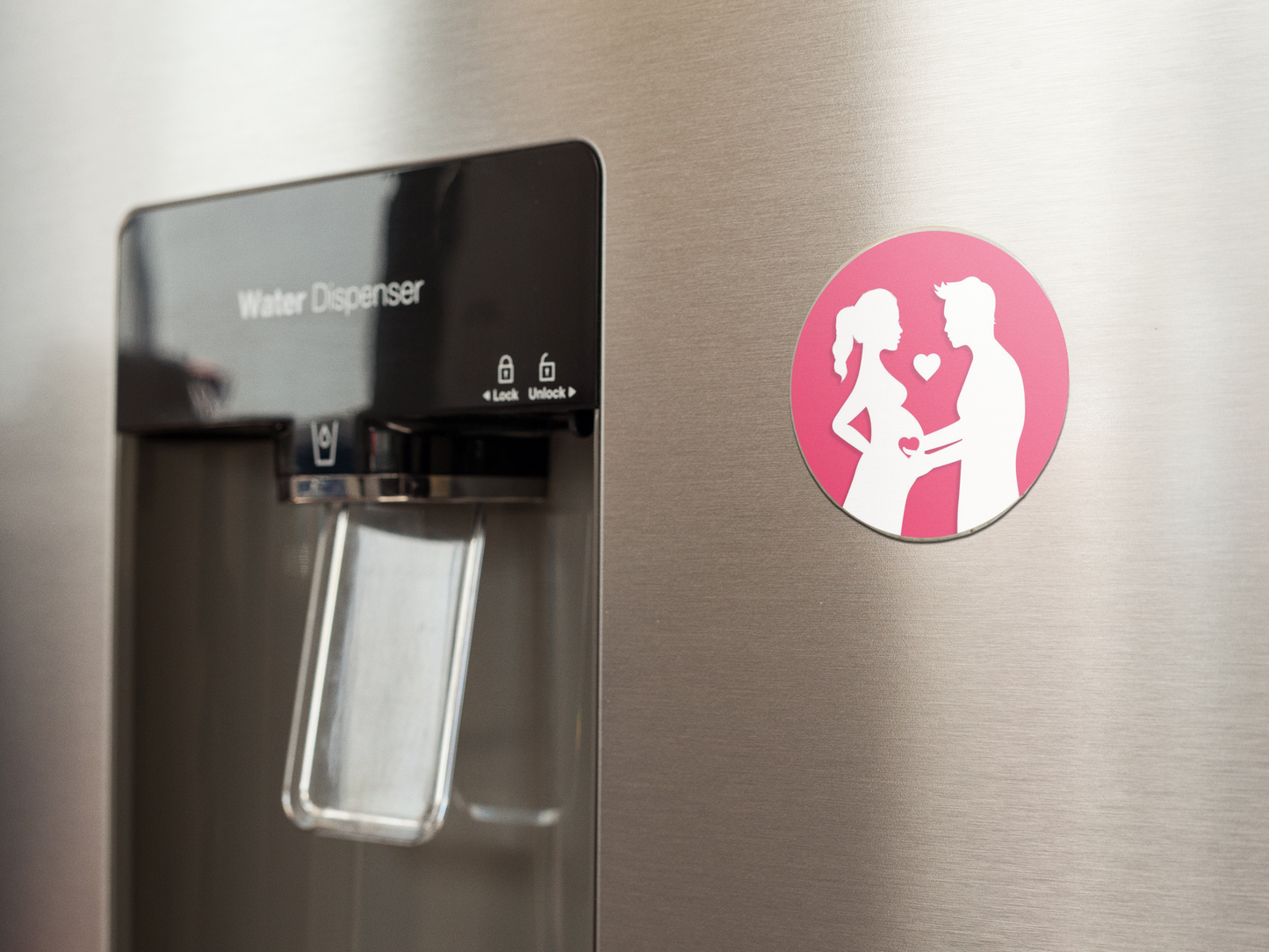 fridge-magnet-mockup-on-a-metallic-fridge-near-the-water-dispenser-a14790