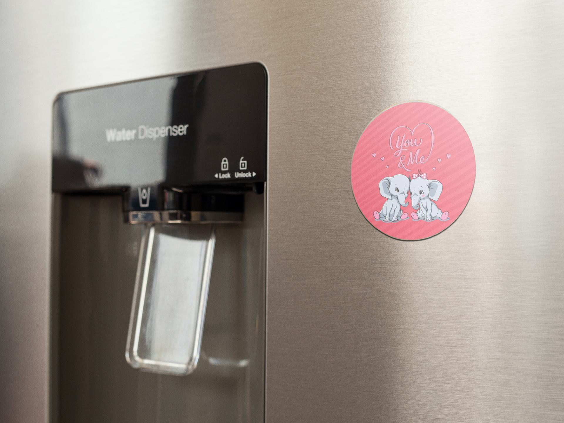 fridge-magnet-mockup-on-a-metallic-fridge-near-the-water-dispenser-a14790