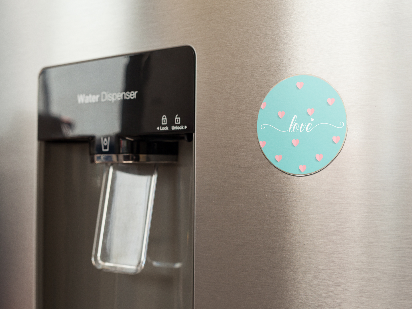 fridge-magnet-mockup-on-a-metallic-fridge-near-the-water-dispenser-a14790
