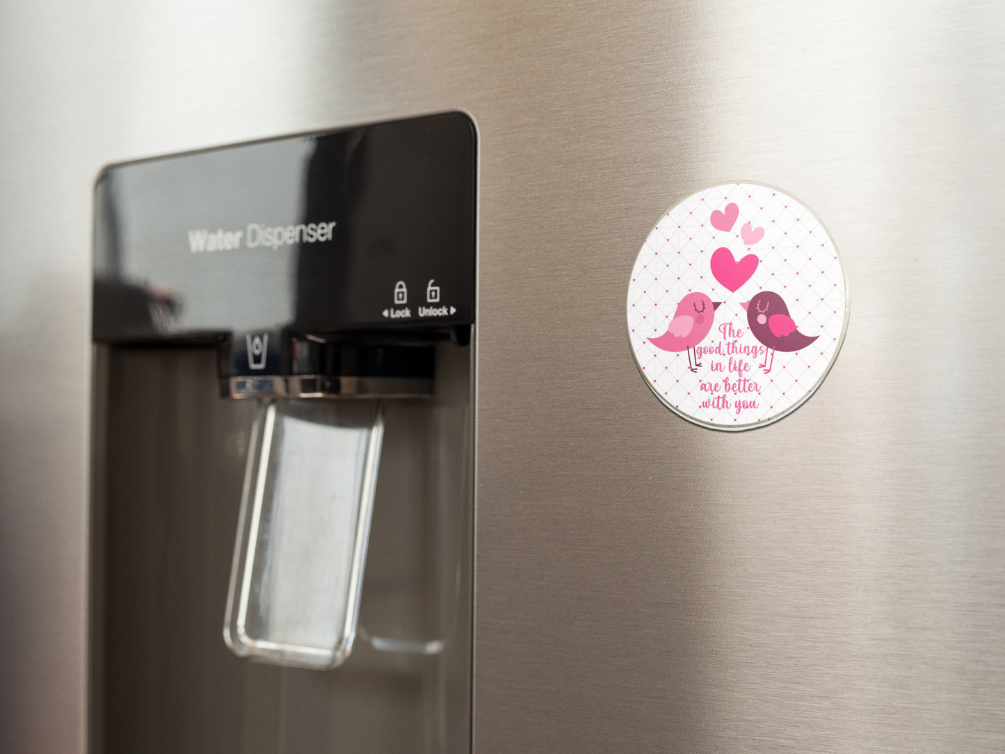 fridge-magnet-mockup-on-a-metallic-fridge-near-the-water-dispenser-a14790