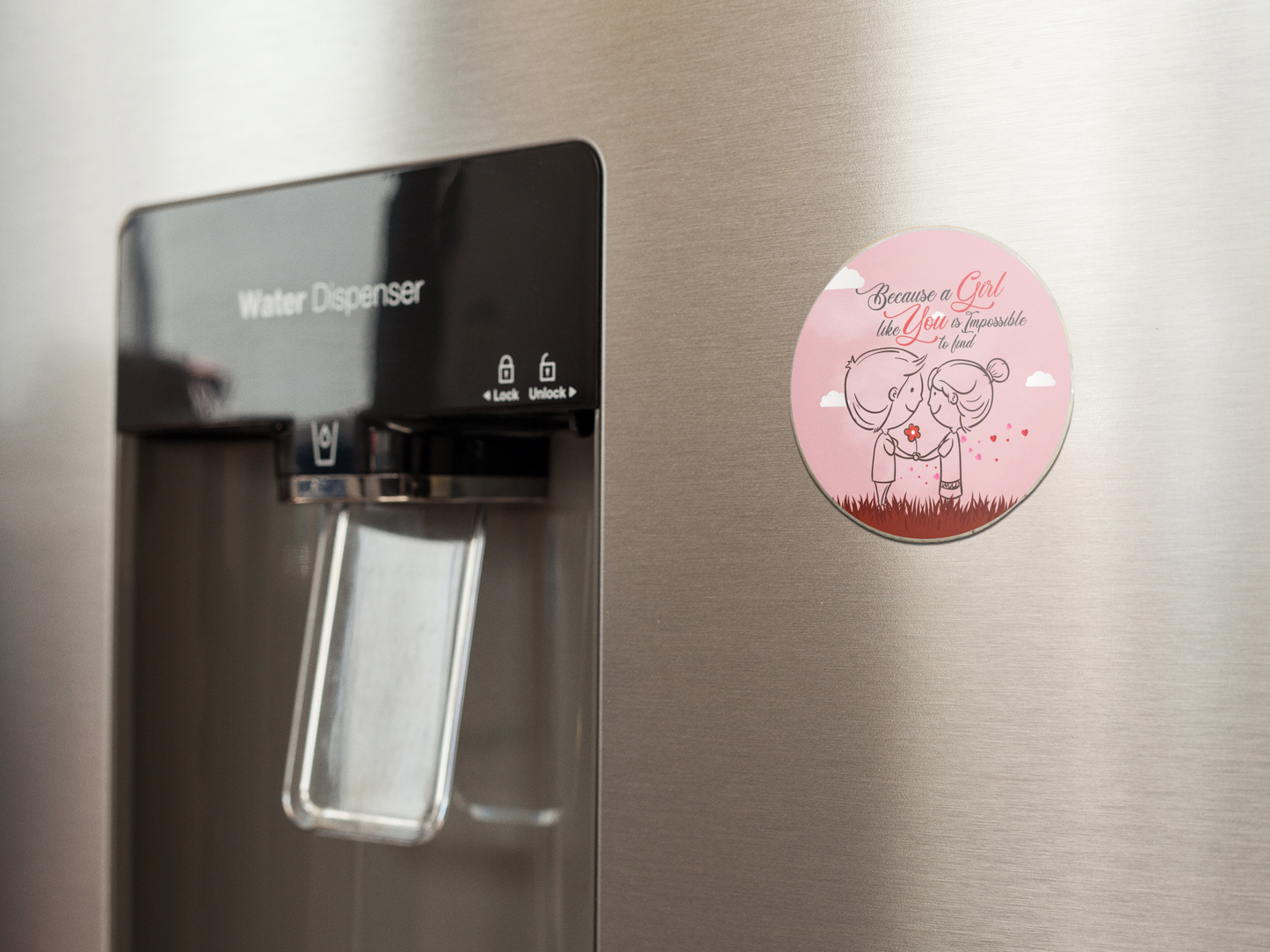 fridge-magnet-mockup-on-a-metallic-fridge-near-the-water-dispenser-a14790