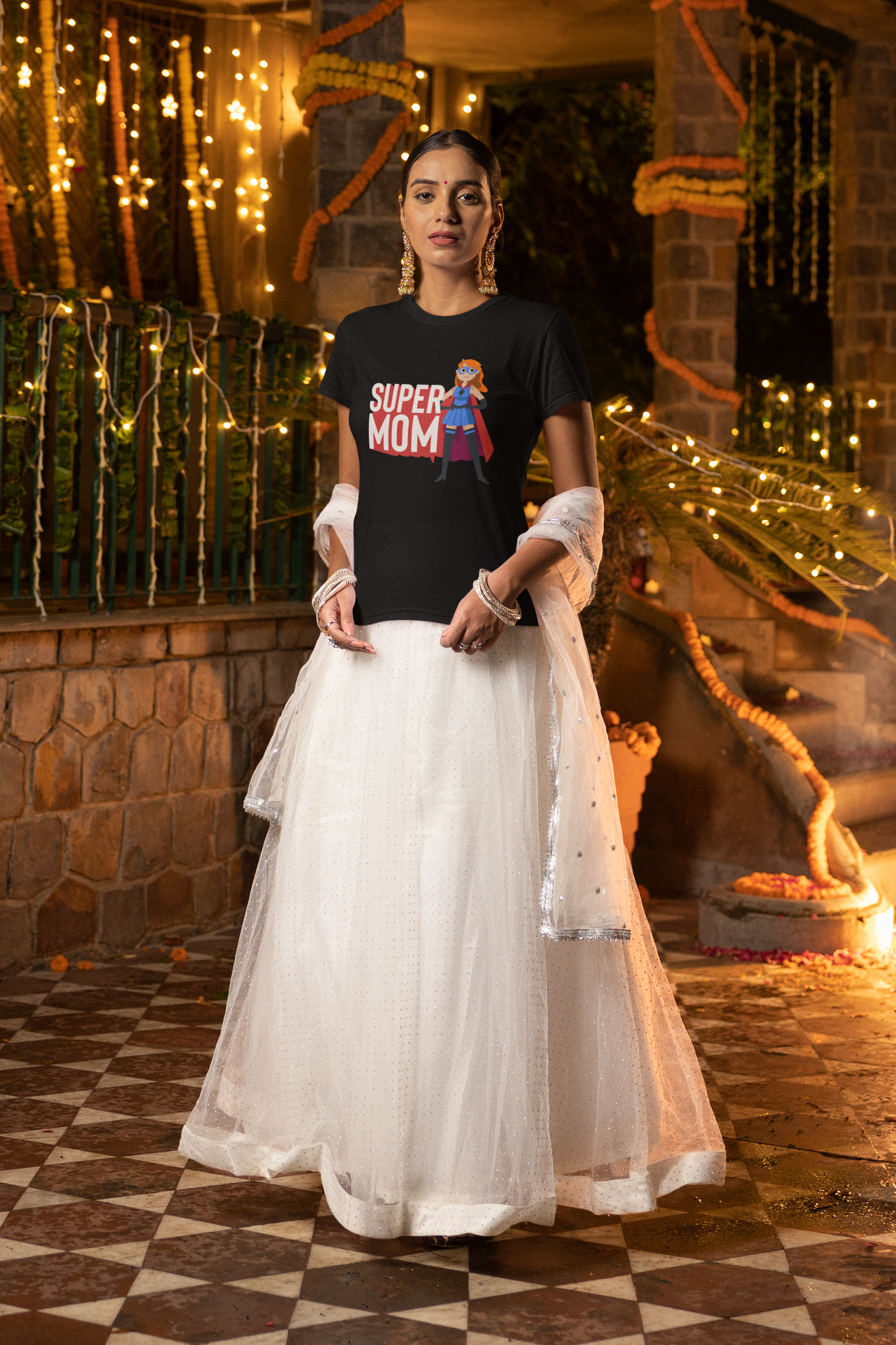 gildan-tee-mockup-of-a-woman-standing-in-a-diwali-decorated-garden-m36015