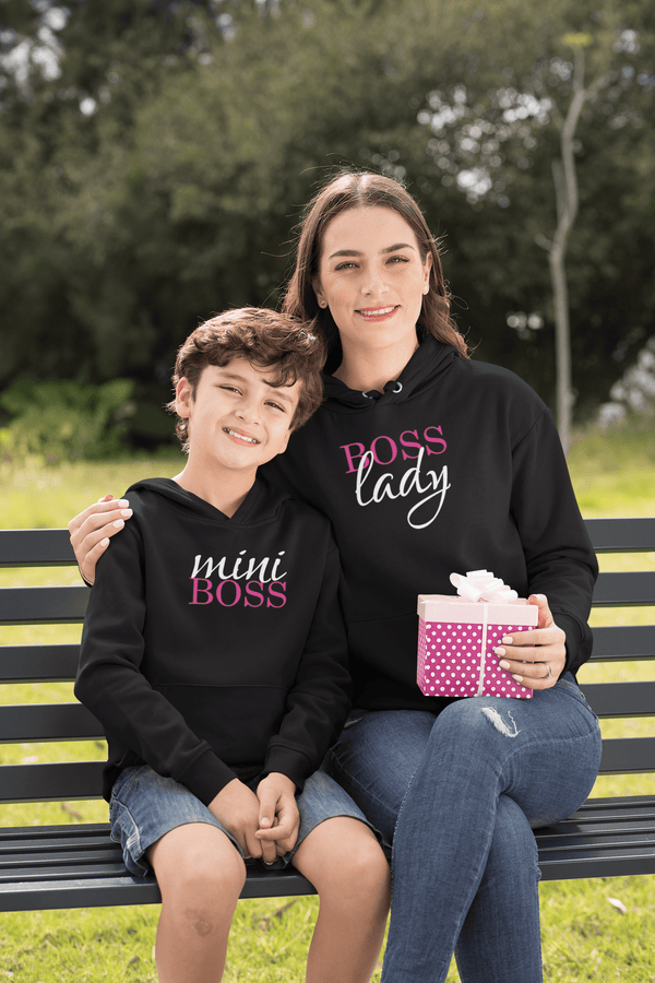 hoodie-mockup-of-a-boy-and-his-mom-sitting-on-a-park-bench-32636-1.png