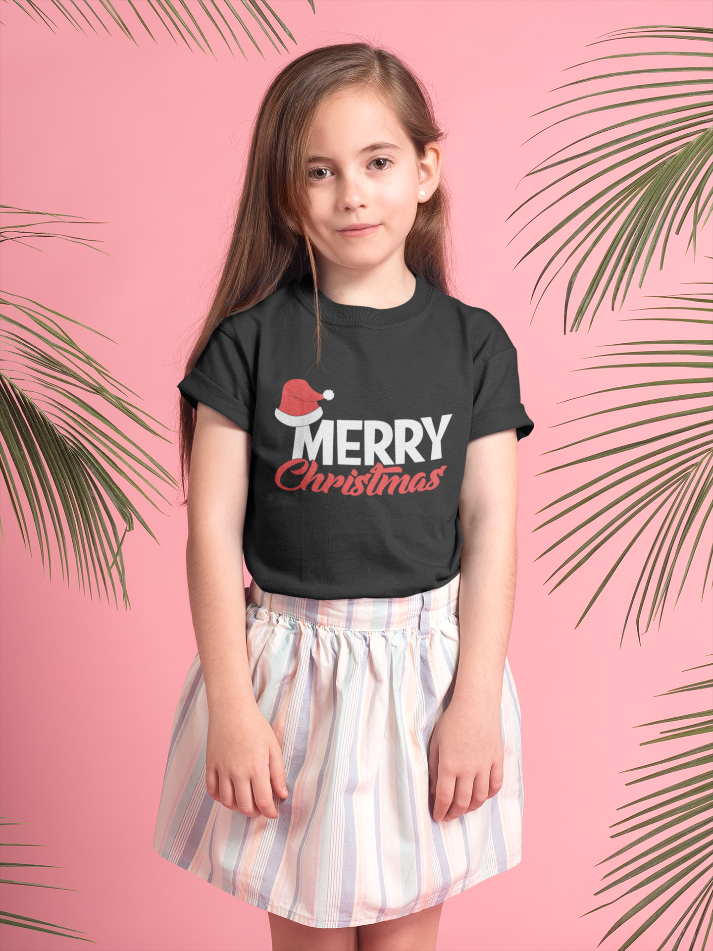 little-blonde-girl-wearing-a-t-shirt-mockup-in-a-pink-room-with-green-leaves-a19908