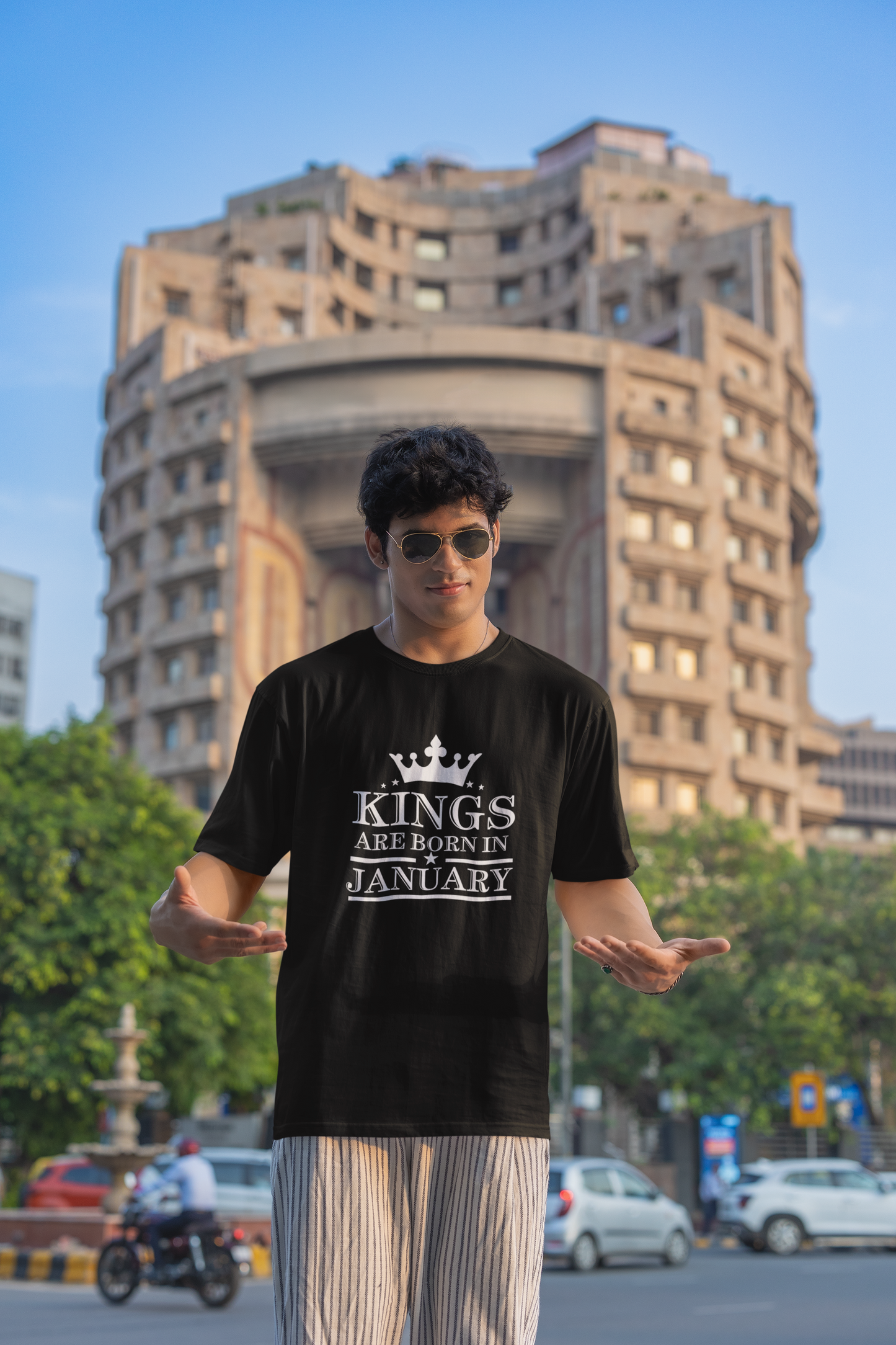 mockup-featuring-a-man-wearing-a-blinkstore-t-shirt-and-sunglasses-on-the-street-m39313