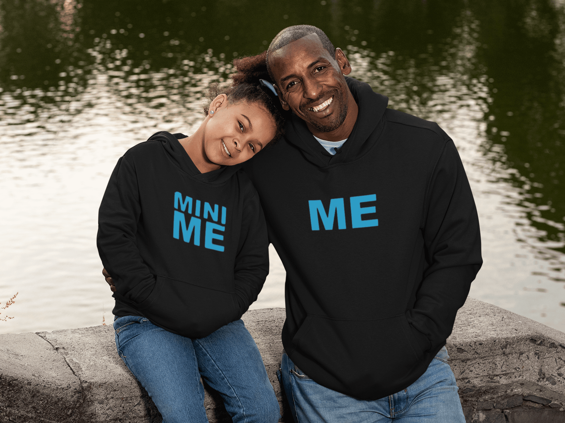 mockup-of-a-dad-and-a-daughter-wearing-a-hoodie-by-the-lake-31397.png