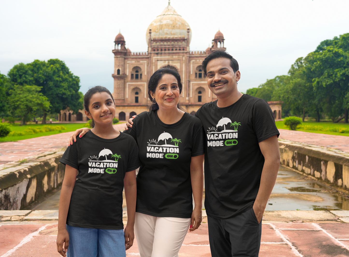 mockup-of-a-family-wearing-t-shirts-while-posing-by-an-indian-temple-m29692