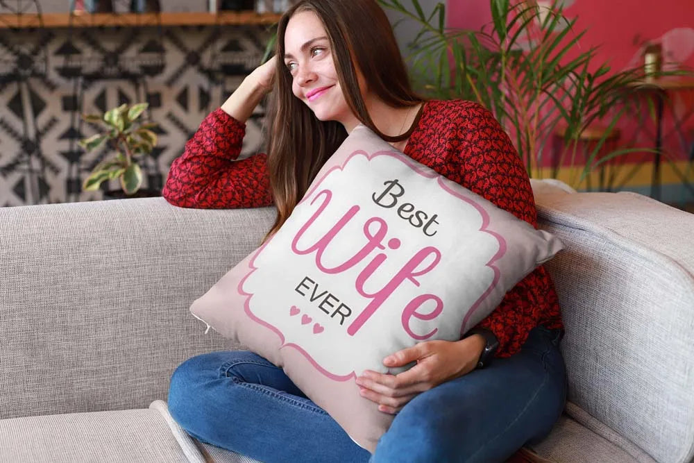 mockup-of-a-happy-girl-holding-a-pillow-sitting-on-a-sofa-23607 (1)