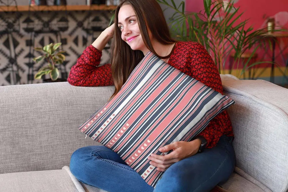 mockup-of-a-happy-girl-holding-a-pillow-sitting-on-a-sofa-23607