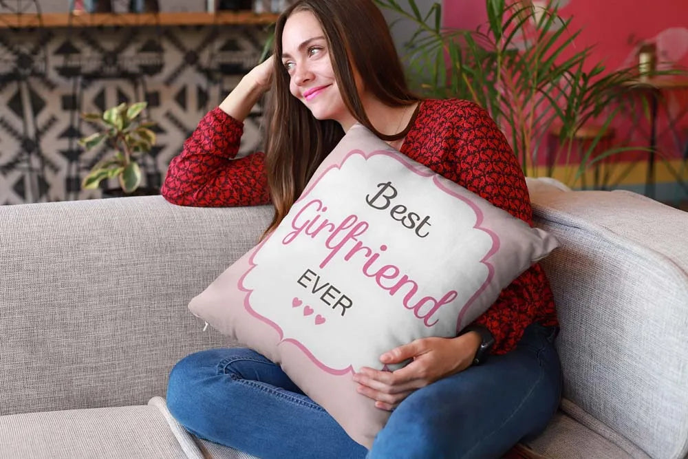 mockup-of-a-happy-girl-holding-a-pillow-sitting-on-a-sofa-23607 (1)_1