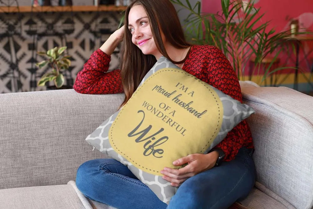 mockup-of-a-happy-girl-holding-a-pillow-sitting-on-a-sofa-23607